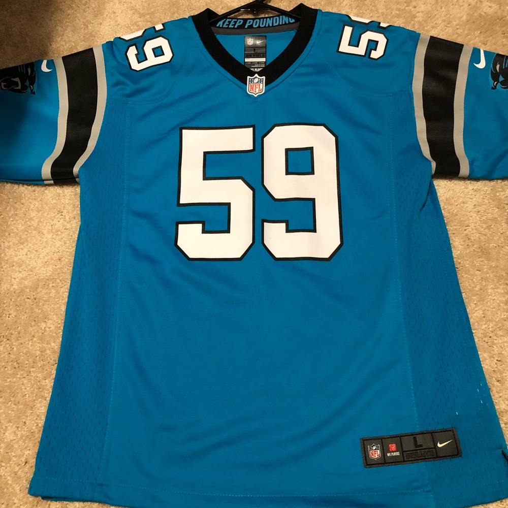 Women’s large Luke Kuechly Jersey NWOT